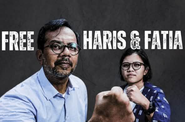 Les activistes pour les droits humains Haris Azhar et Fatia Maulidiyanti avec la phrase "Free Haris & Fatia"